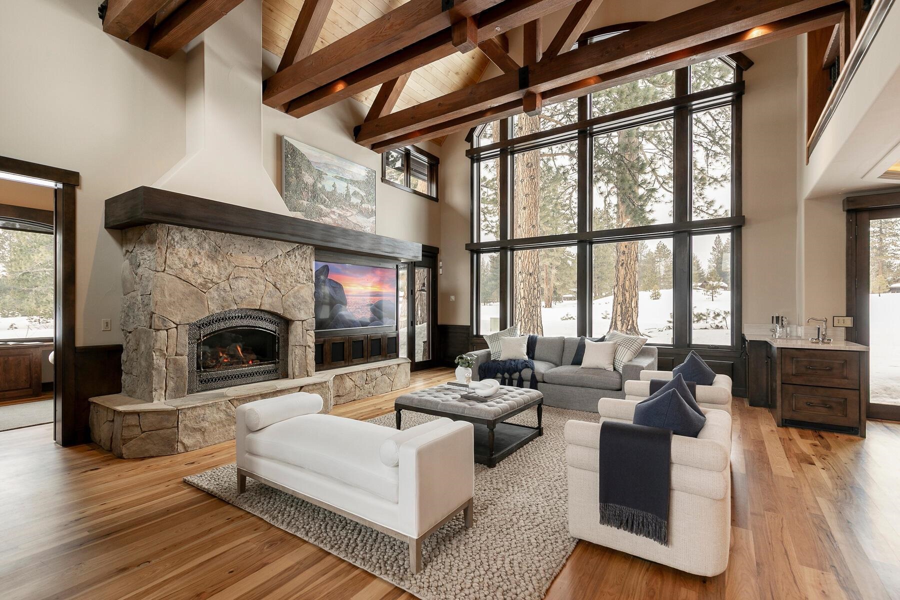 13006 Lookout Loop Truckee, CA 96161 - Photo 5 of 21 a living room with furniture large window and a fireplace