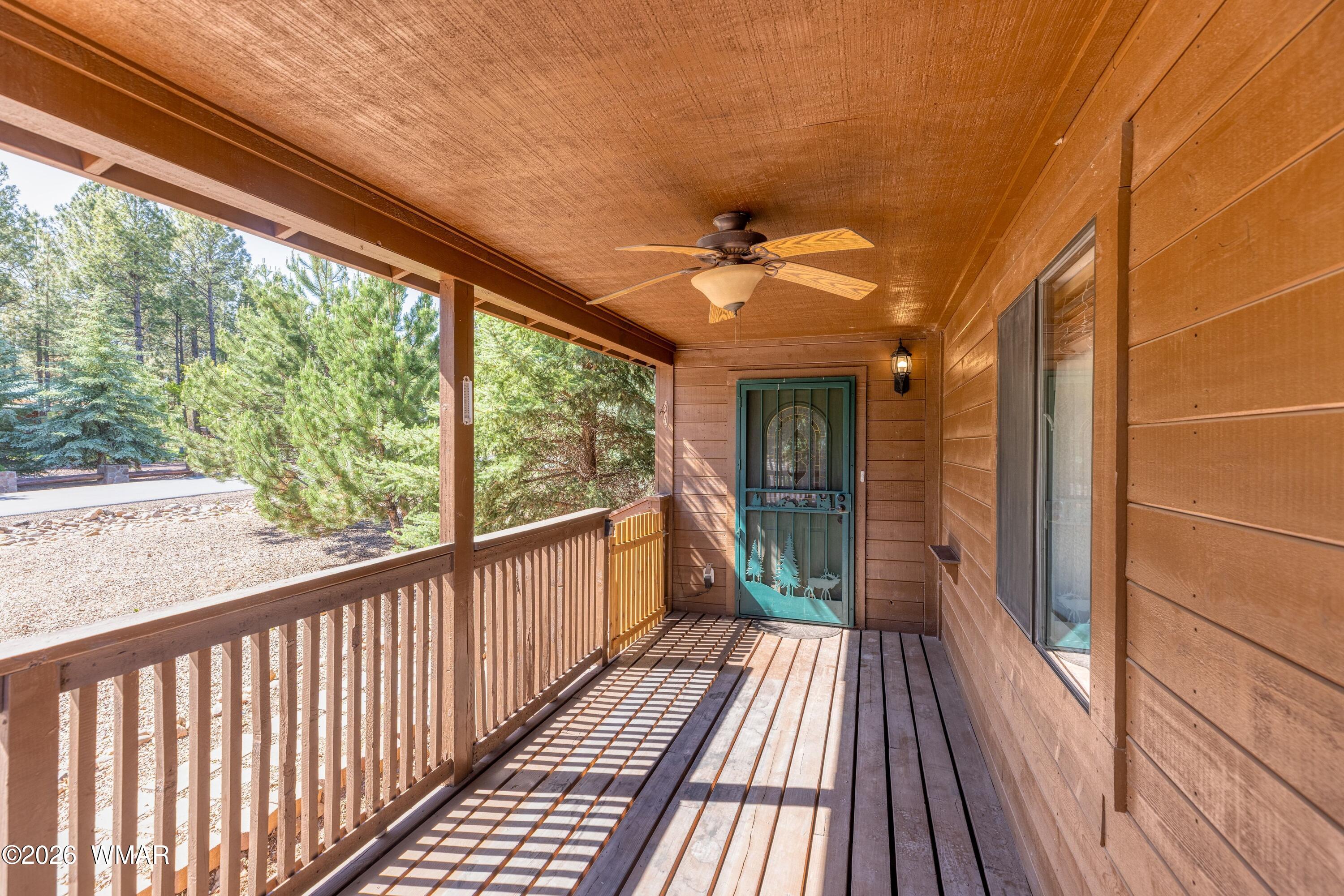 2722 Bain Trail Overgaard, AZ 85933 - Photo 14 of 28 a view of balcony with wooden floor