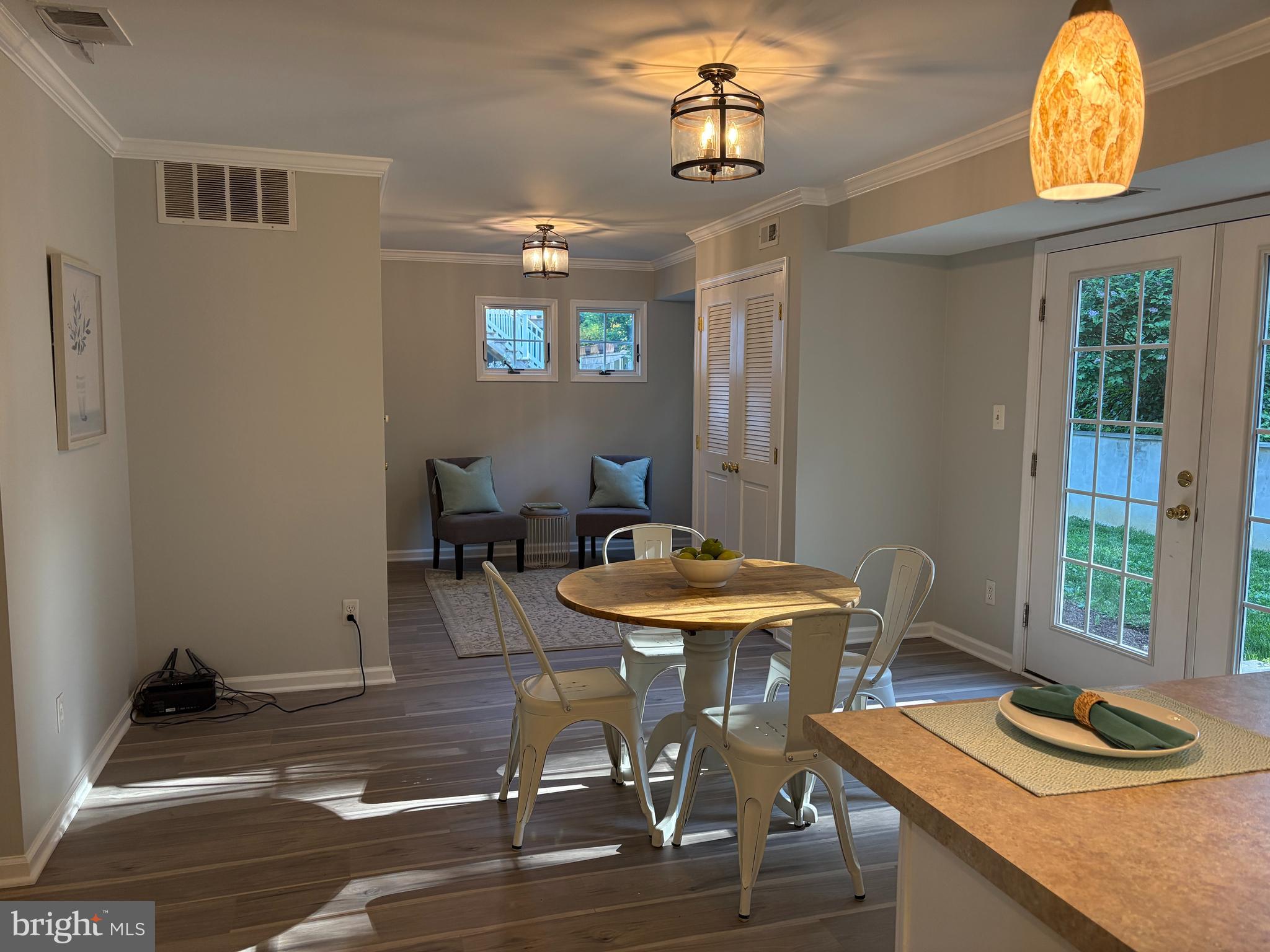 1126 Neptune Place Annapolis, MD 21409 - Photo 20 of 79 a view of a dining room with furniture and a window
