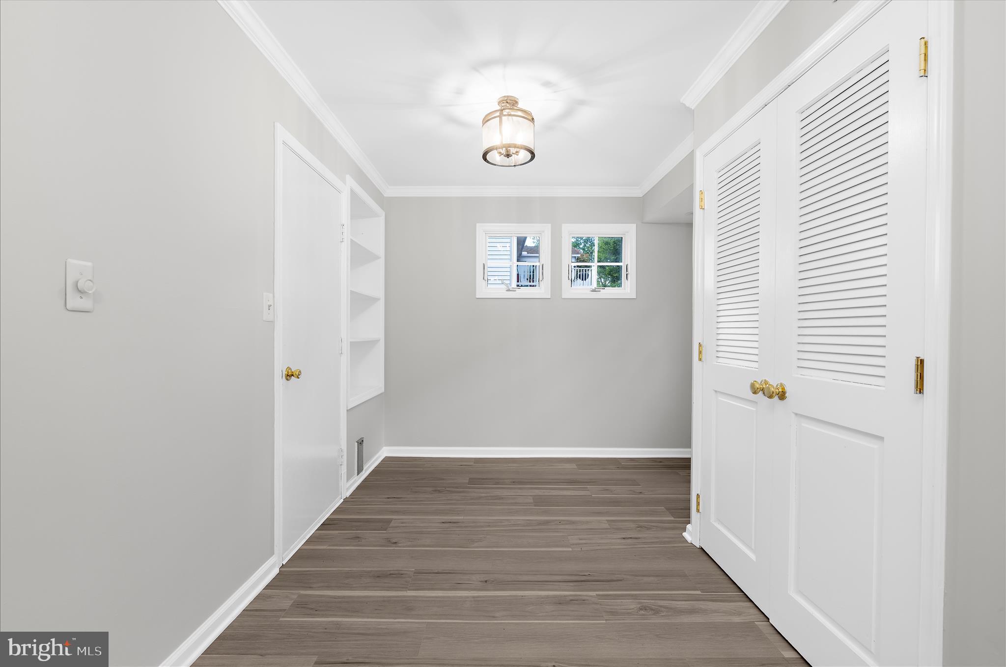 1126 Neptune Place Annapolis, MD 21409 - Photo 21 of 79 a view of a hallway with wooden floor