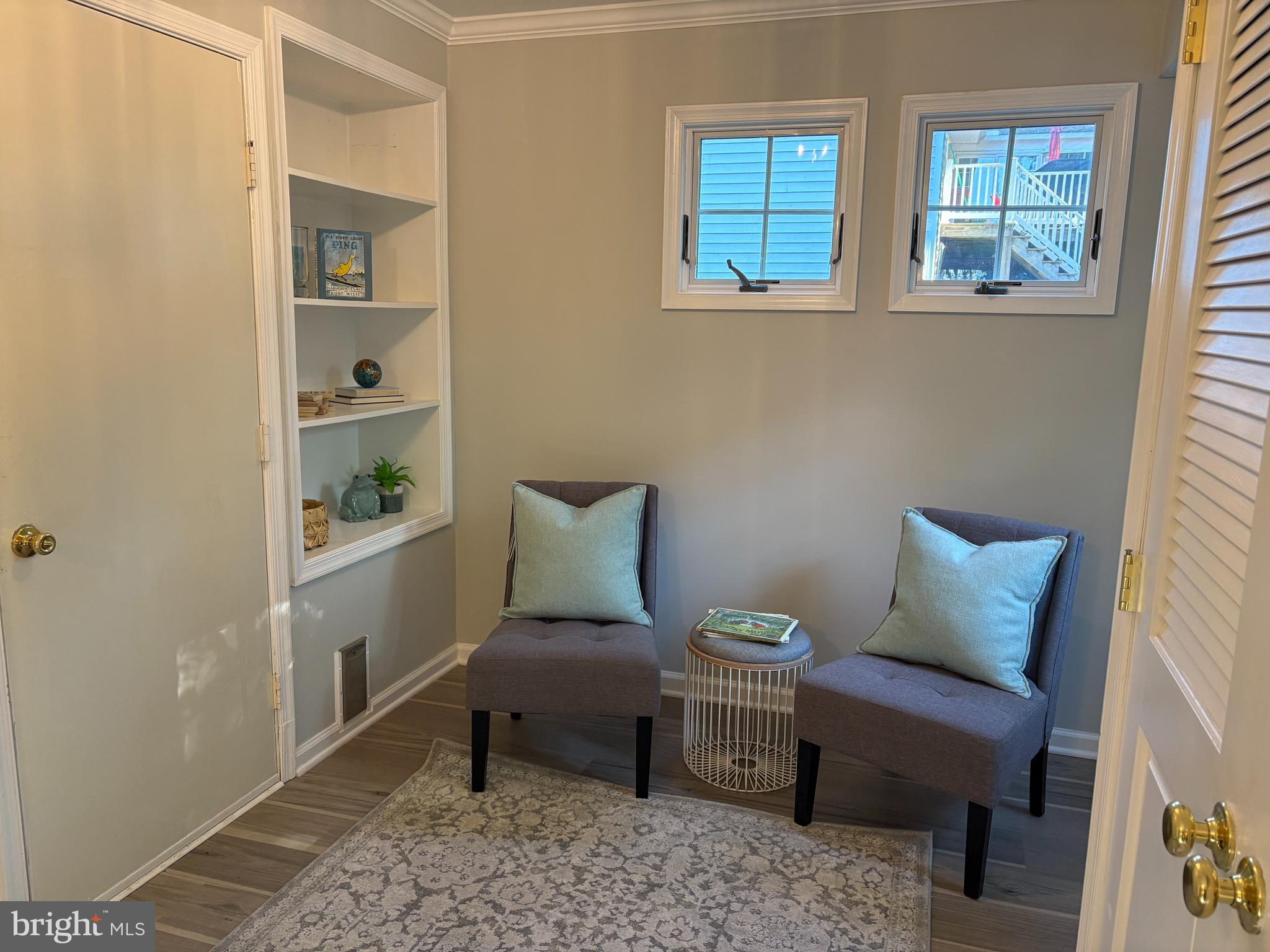 1126 Neptune Place Annapolis, MD 21409 - Photo 23 of 79 a living room with furniture and windows