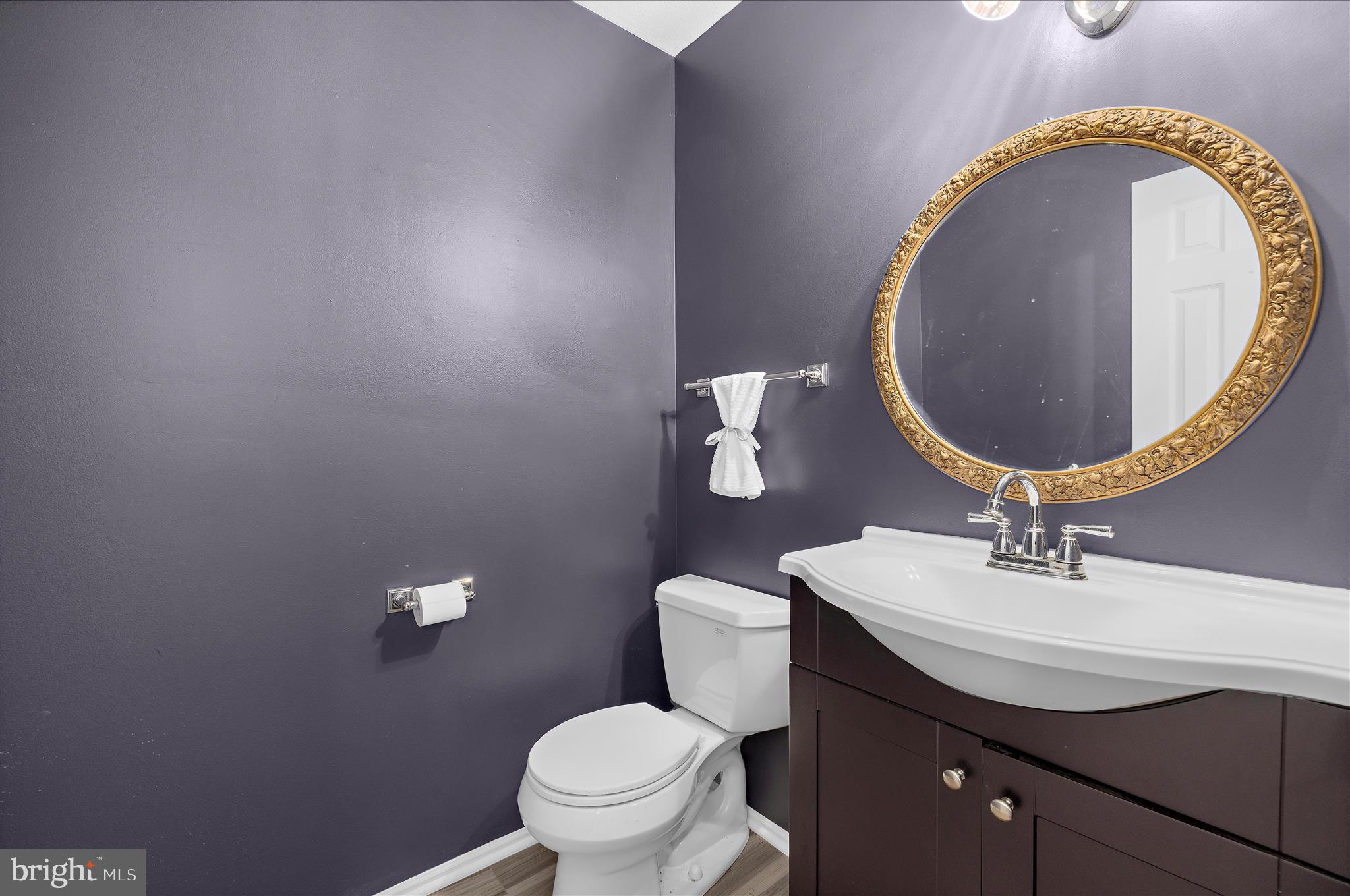 1126 Neptune Place Annapolis, MD 21409 - Photo 27 of 79 a bathroom with a sink mirror and toilet