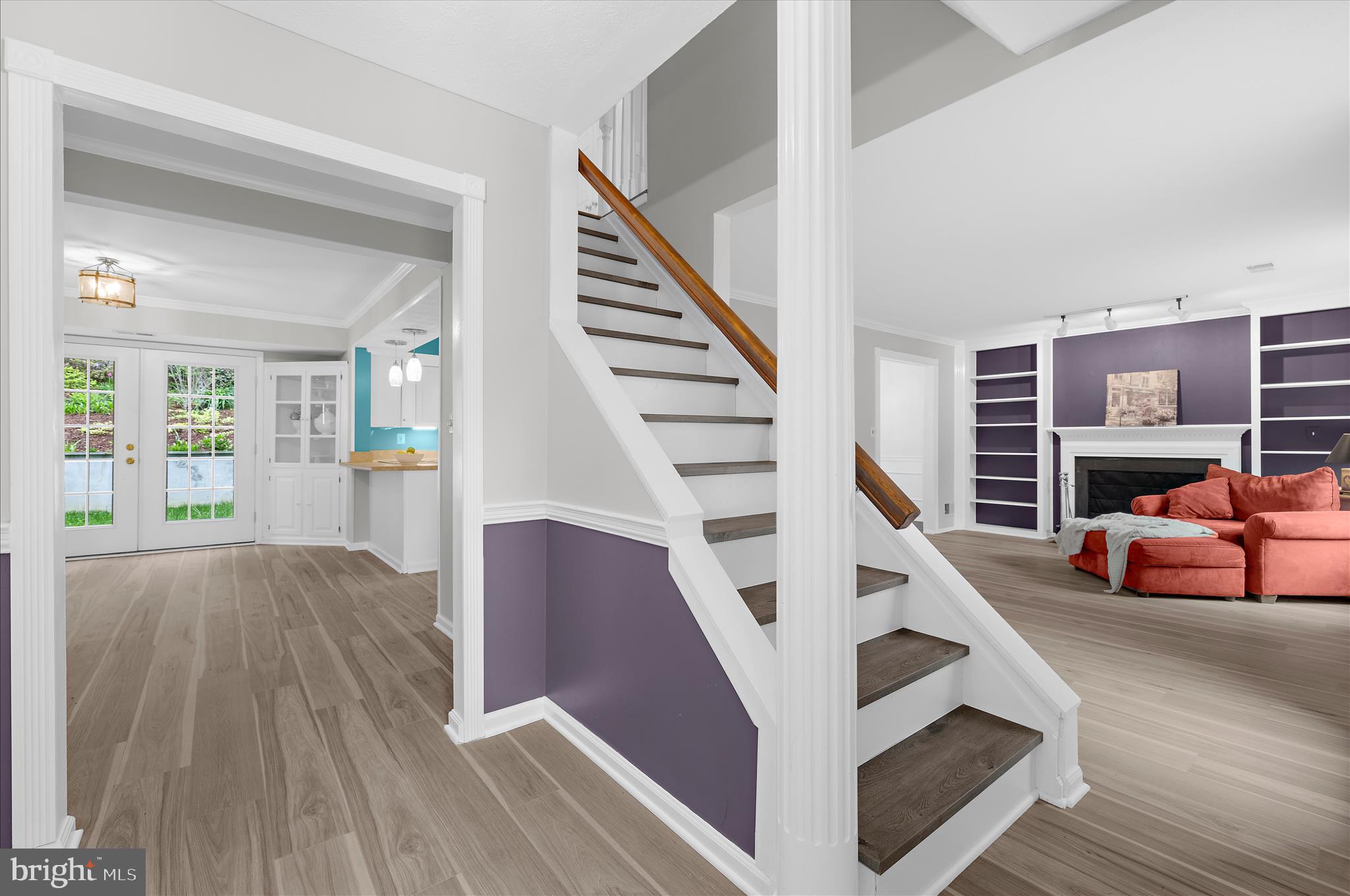 1126 Neptune Place Annapolis, MD 21409 - Photo 29 of 79 a view of entryway livingroom and hall with wooden floor