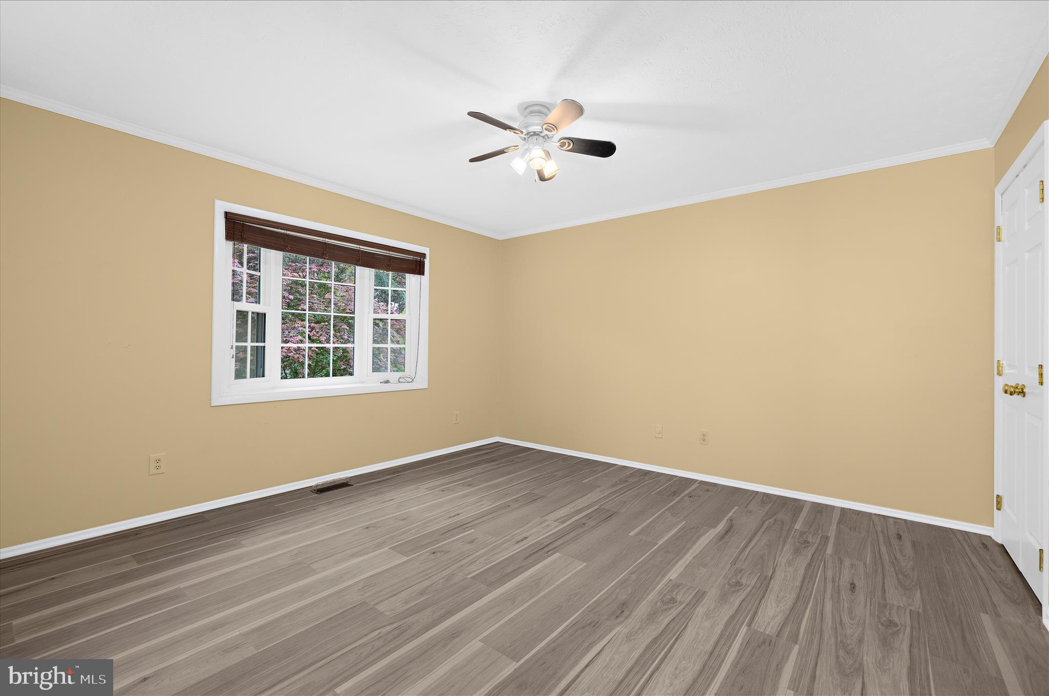 1126 Neptune Place Annapolis, MD 21409 - Photo 30 of 79 a view of an empty room with wooden floor and a window