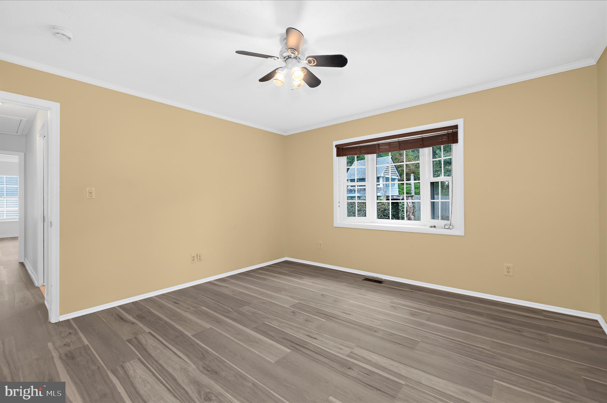 1126 Neptune Place Annapolis, MD 21409 - Photo 32 of 79 a view of empty room with wooden floor and fan