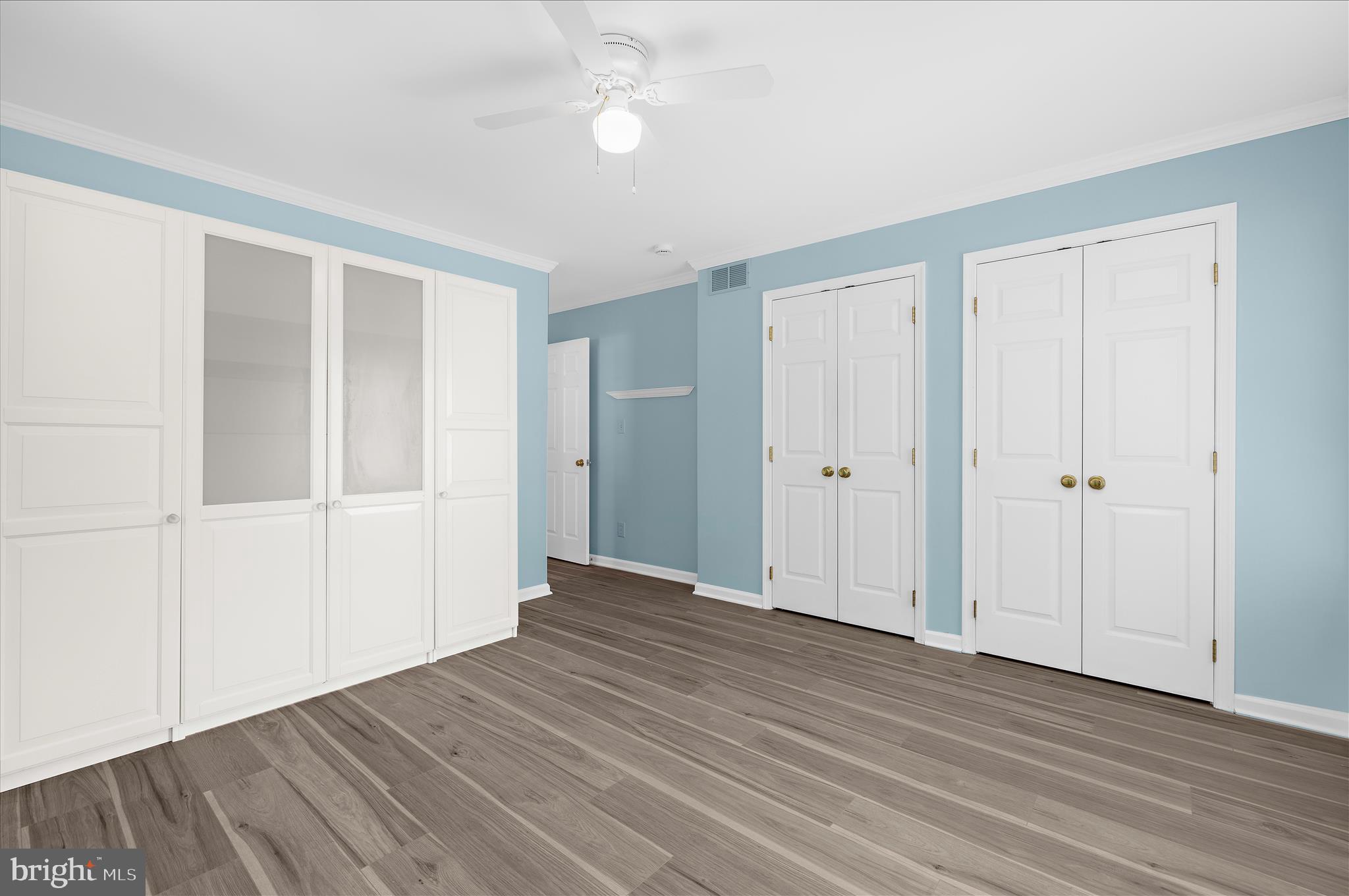 1126 Neptune Place Annapolis, MD 21409 - Photo 45 of 79 a view of an empty room with wooden floor