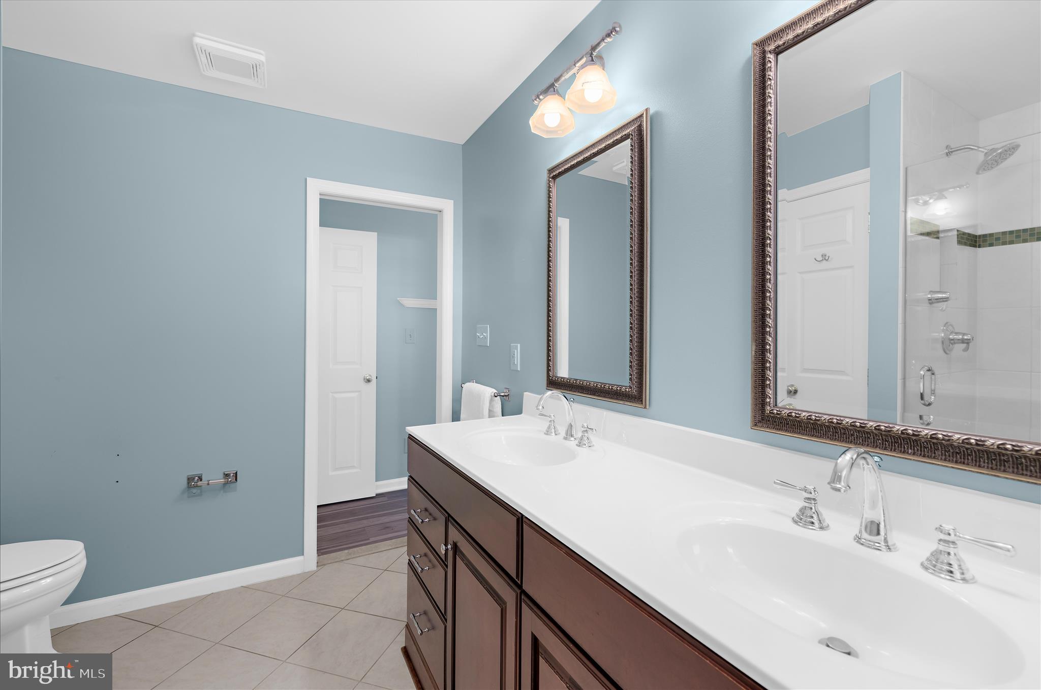1126 Neptune Place Annapolis, MD 21409 - Photo 47 of 79 a bathroom with a sink and a mirror