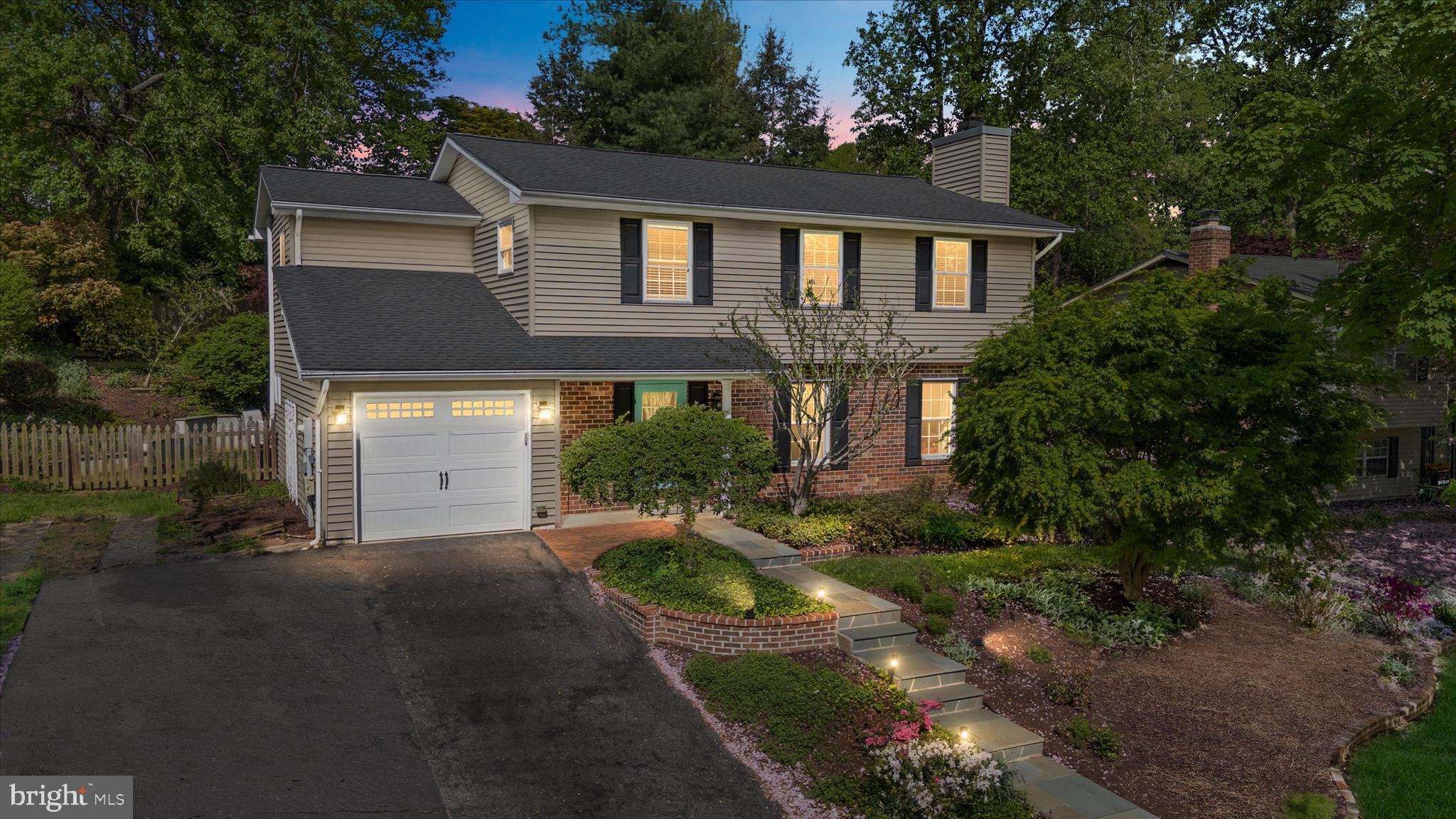 1126 Neptune Place Annapolis, MD 21409 - Photo 6 of 79 a front view of a house with a yard