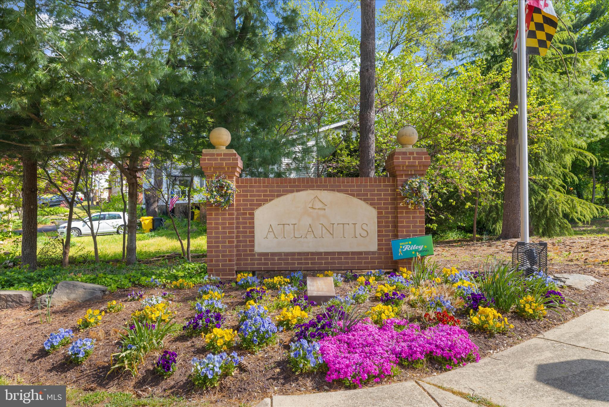 1126 Neptune Place Annapolis, MD 21409 - Photo 61 of 79 a sign that is in front of flowers