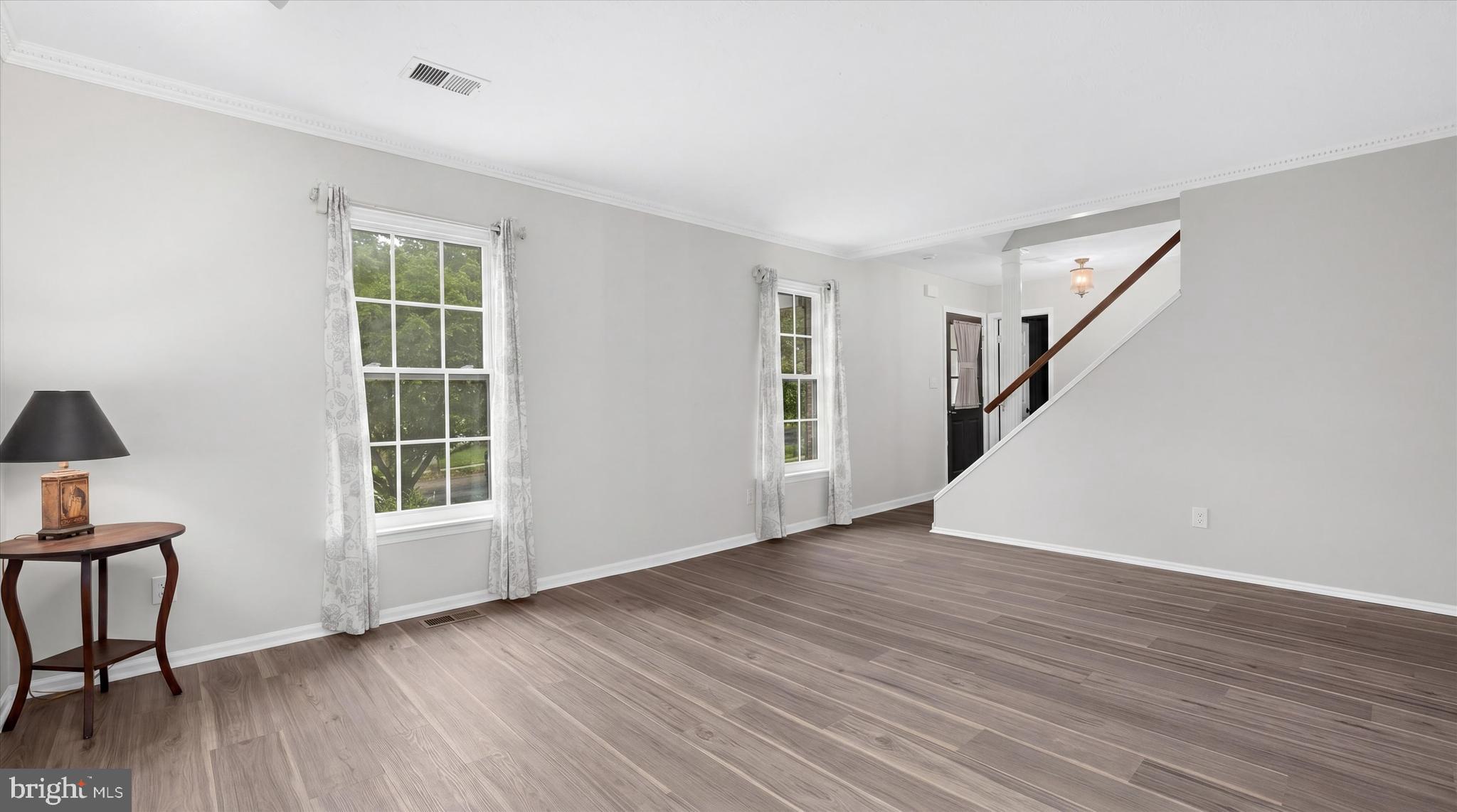 1126 Neptune Place Annapolis, MD 21409 - Photo 7 of 79 Living room - gleaming new flooring throughout