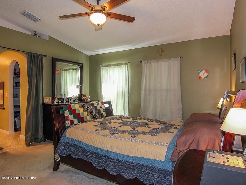 76342 Longleaf Loop Yulee, FL 32097 - Photo 12 of 27 Master Bedroom