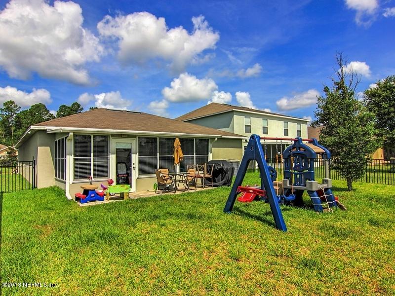 76342 Longleaf Loop Yulee, FL 32097 - Photo 23 of 27 Backyard