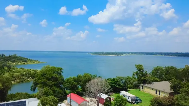 a view of a lake from a yard