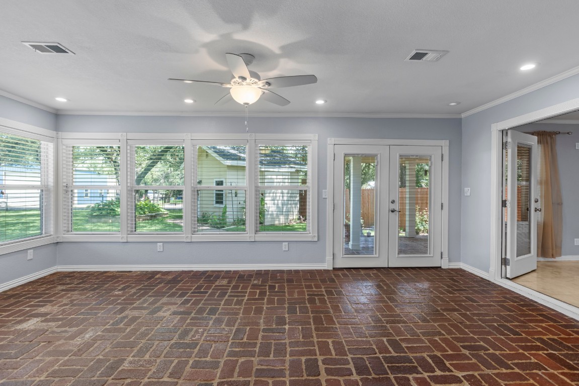 3745 Canyon Heights Road Belton, TX 76513 - Photo 5 of 29 a view of an empty room with wooden floor and a window