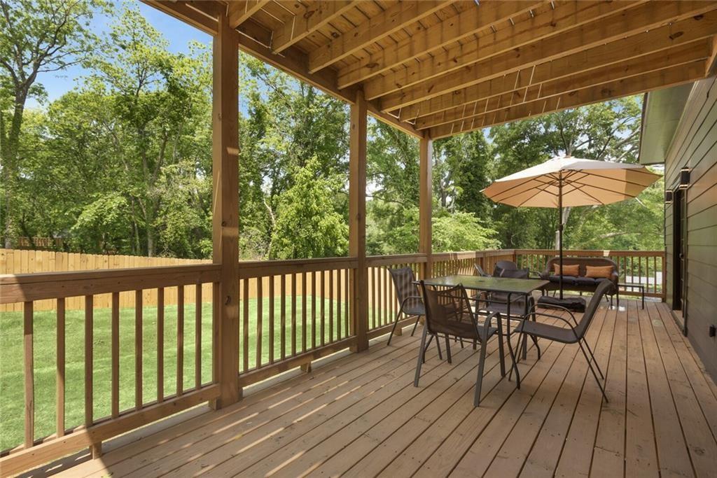 255 Mathewson Place Southwest Atlanta, GA 30314 - Photo 25 of 32 a view of a two chairs and table in the balcony