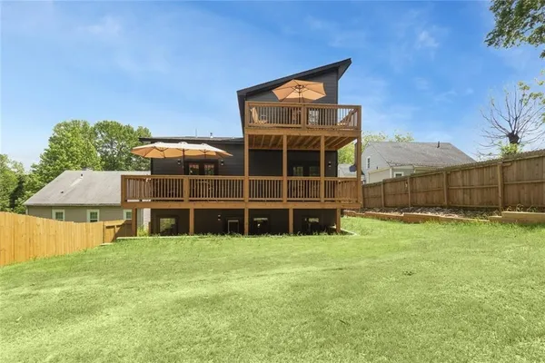 a view of backyard with tree