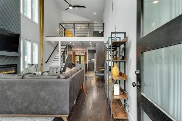 a view of living room with furniture and flat screen tv