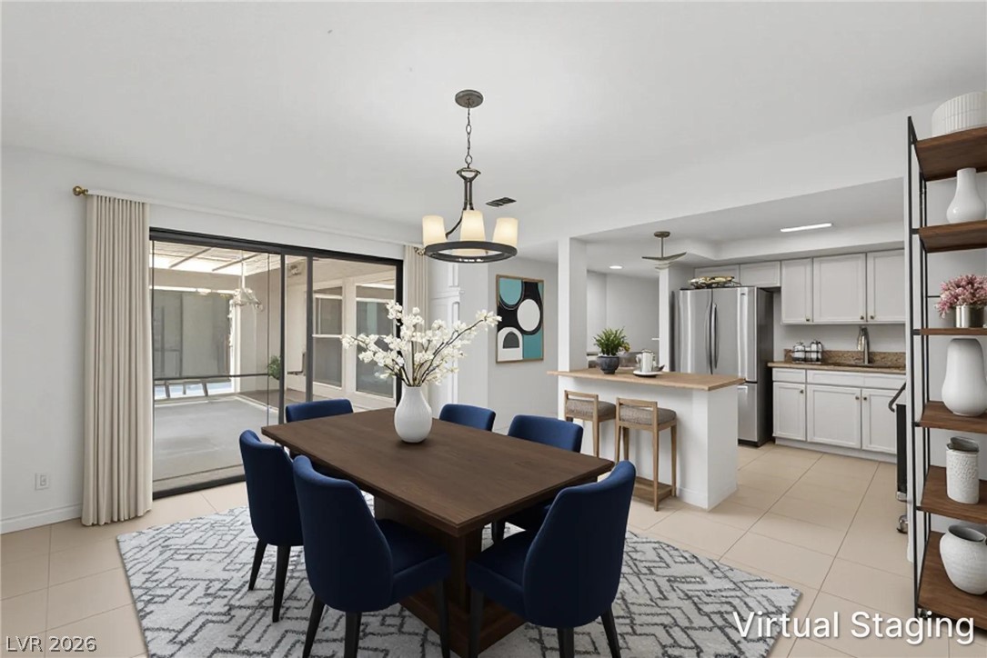 5620 Roseridge Avenue Las Vegas, NV 89107 - Photo 11 of 55 Virtual Staging: This bright dining area seamlessly connects to the outdoors, perfect for gatherings.