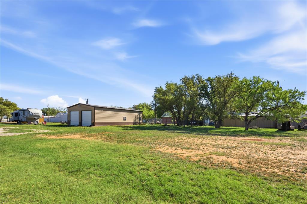 4441 Pawnee Drive May, TX 76857 - Photo 12 of 12 a view of a big yard with a house