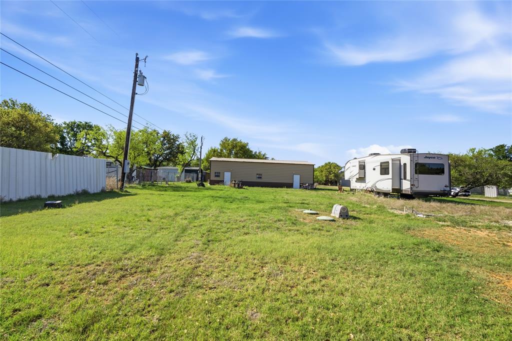 4441 Pawnee Drive May, TX 76857 - Photo 7 of 12 a house view with a garden space