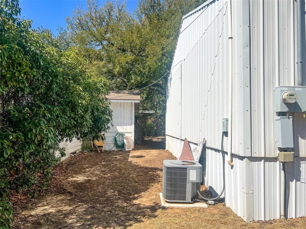 1833 W Highway, Unit AZ Springtown, TX 76082 - Photo 3 of 18 a view of a house with backyard and sitting area