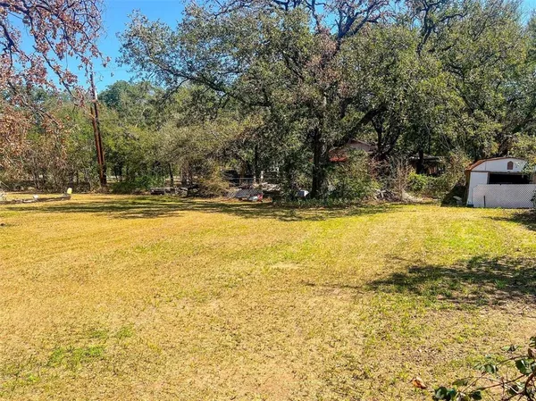 a view of yard covered with snow