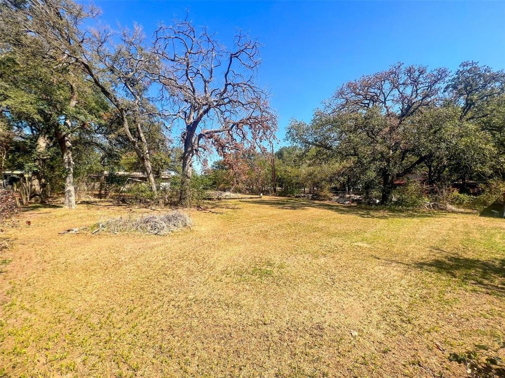 1833 W Highway, Unit AZ Springtown, TX 76082 - Photo 9 of 18 a view of yard covered with snow