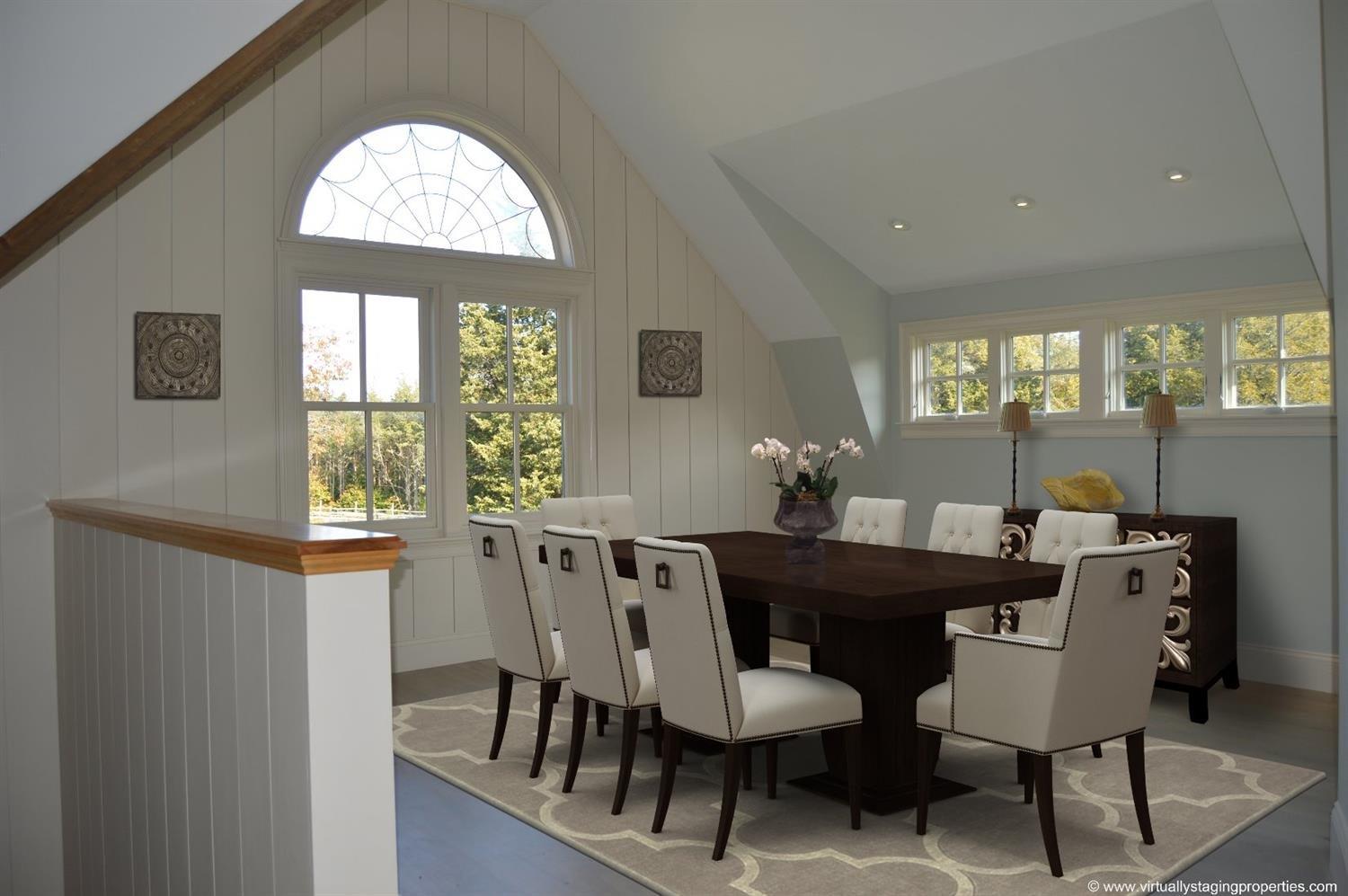 49-55 Rocky Point Road Bourne, MA 02532 - Photo 13 of 42 a view of a dining room with furniture window and wooden floor