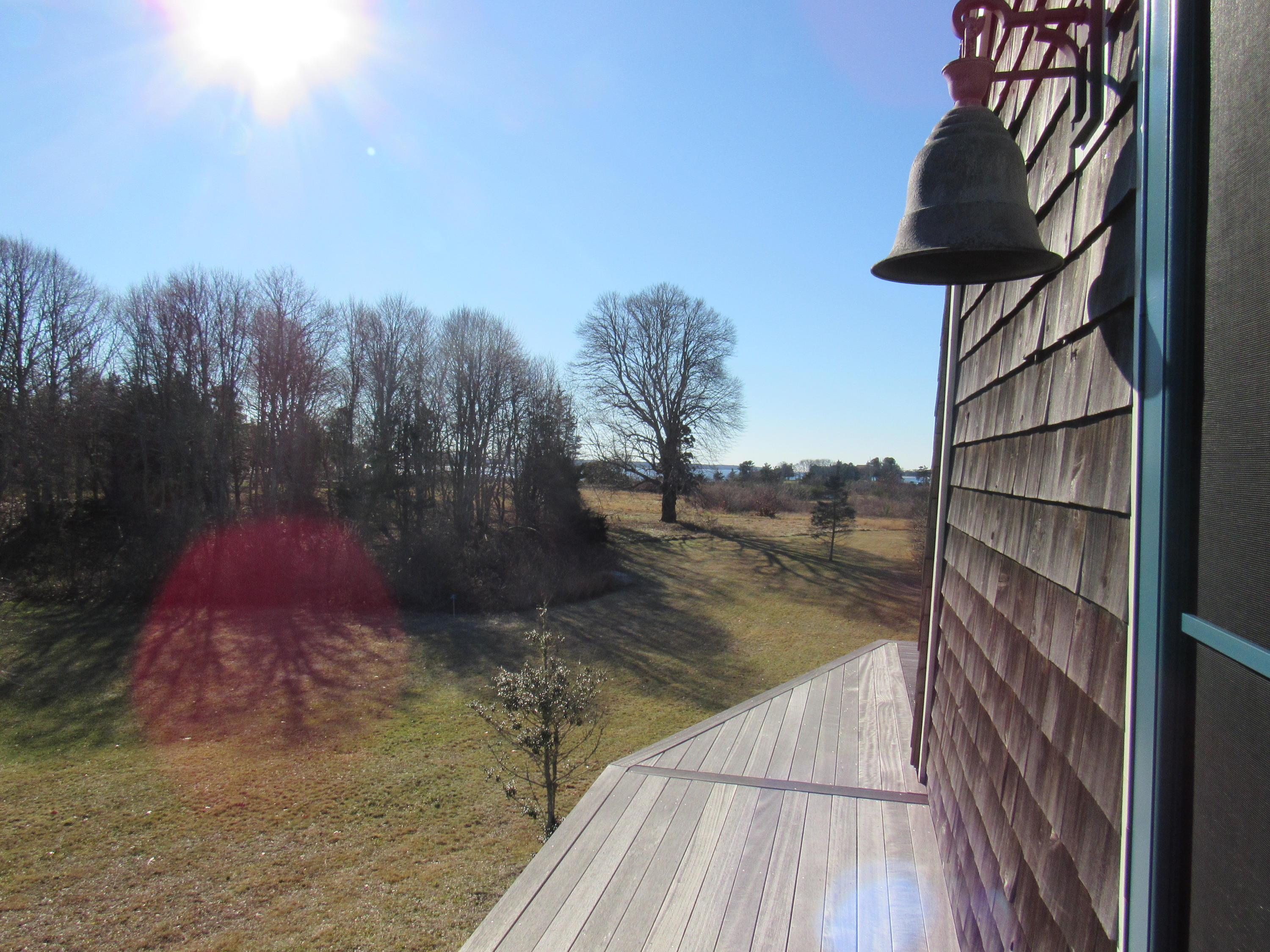 49-55 Rocky Point Road Bourne, MA 02532 - Photo 18 of 42 a view of a backyard of the house