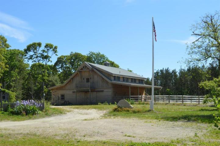 49-55 Rocky Point Road Bourne, MA 02532 - Photo 20 of 42 a house view with a garden space