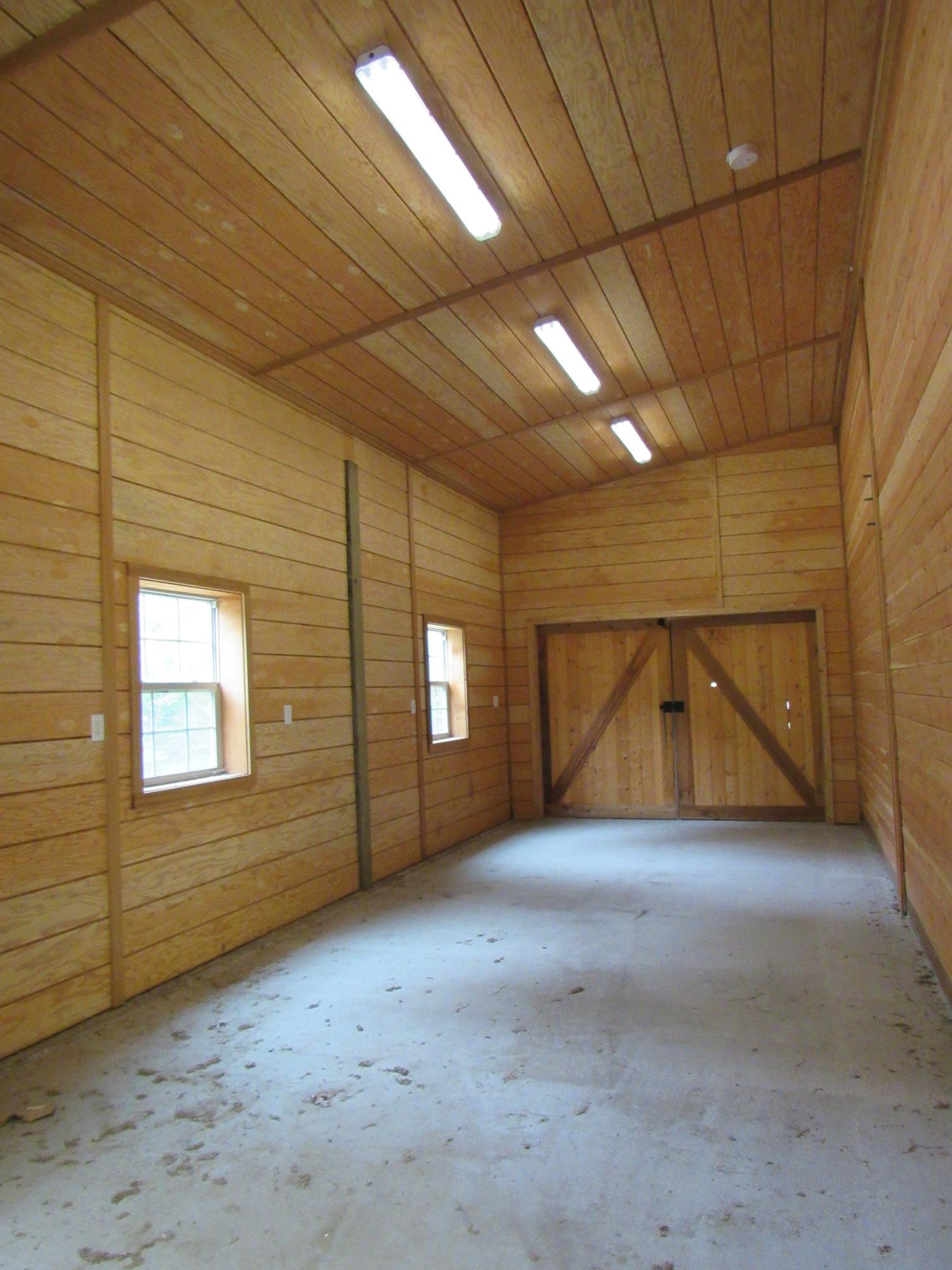 49-55 Rocky Point Road Bourne, MA 02532 - Photo 24 of 42 a view of an empty room with windows