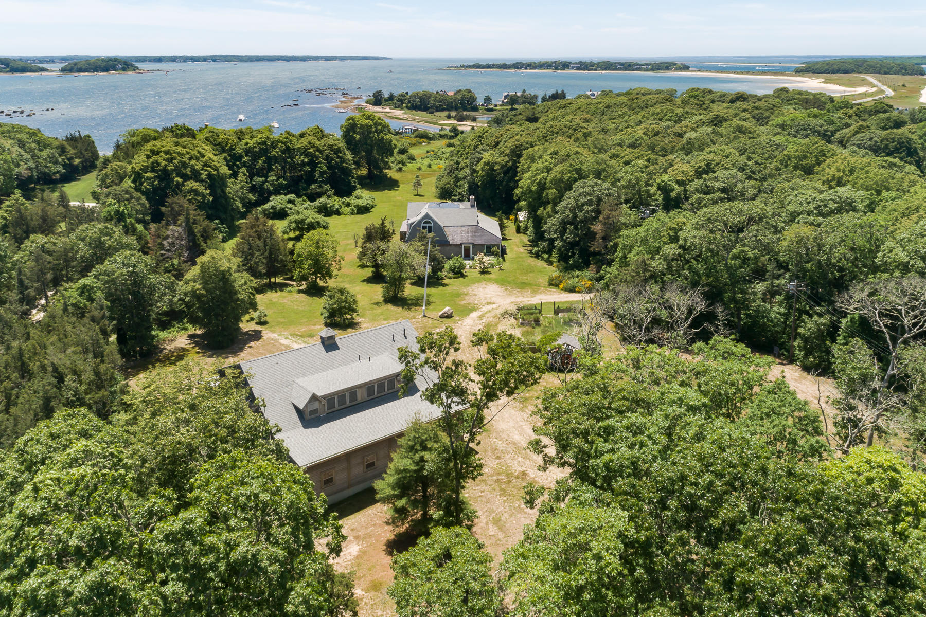 49-55 Rocky Point Road Bourne, MA 02532 - Photo 34 of 42 an aerial view of a houses with a yard