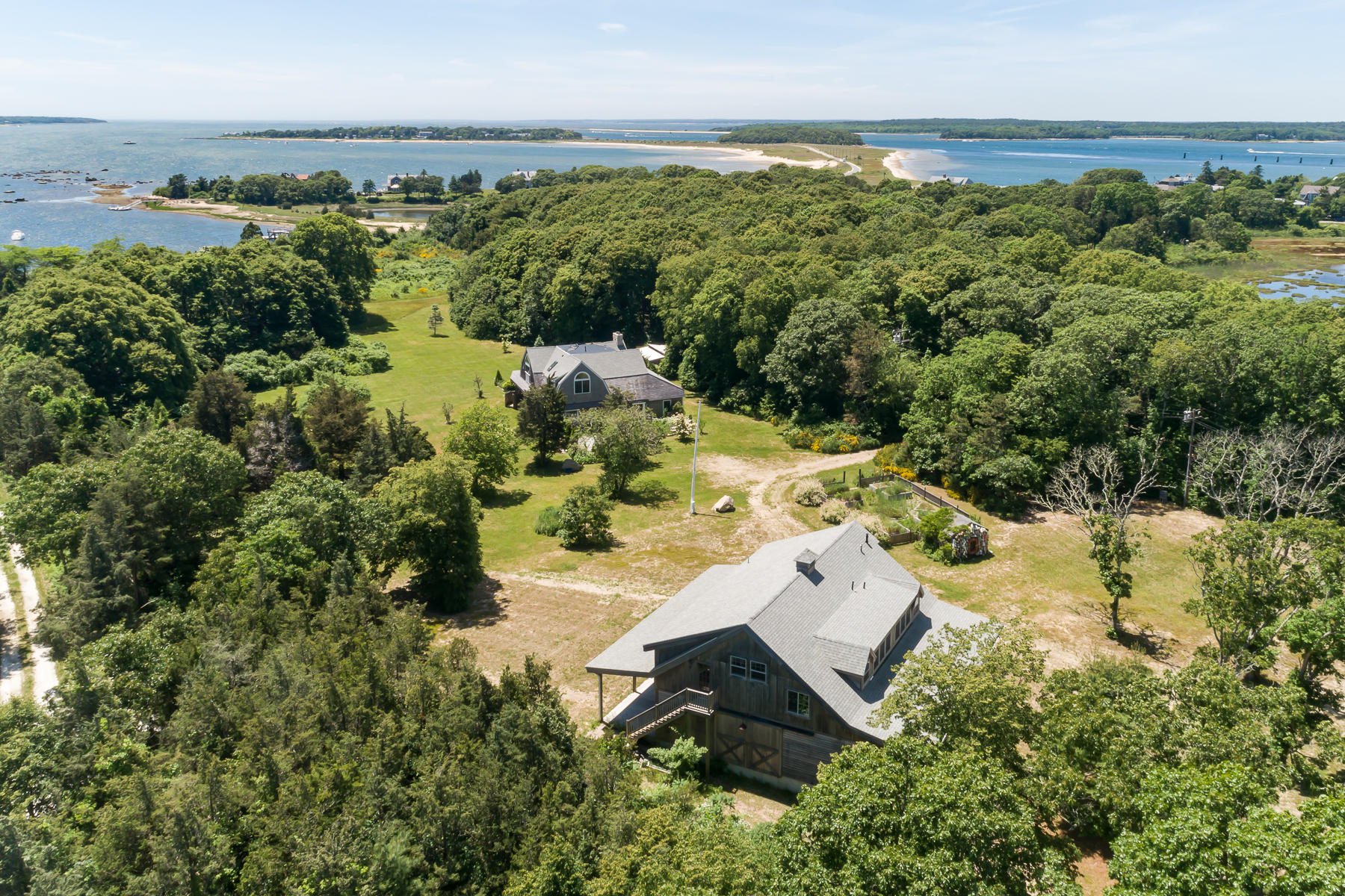 49-55 Rocky Point Road Bourne, MA 02532 - Photo 35 of 42 an aerial view of a house with a yard