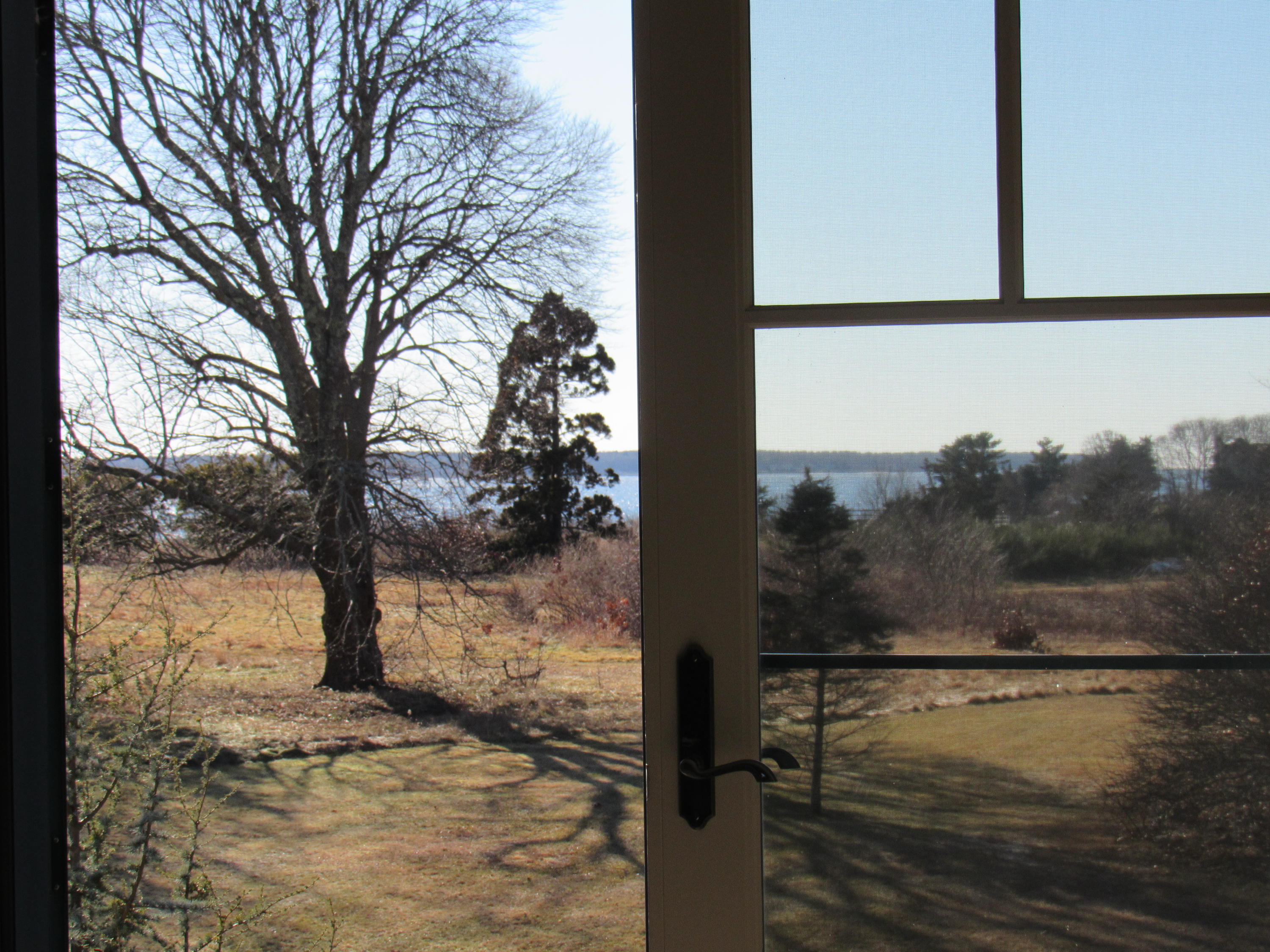 49-55 Rocky Point Road Bourne, MA 02532 - Photo 7 of 42 a view of a lake from a window