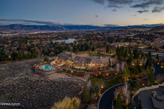 a living room with a fireplace and a table