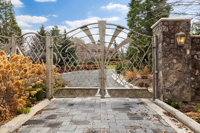 a bathroom with a sink mirror and toilet