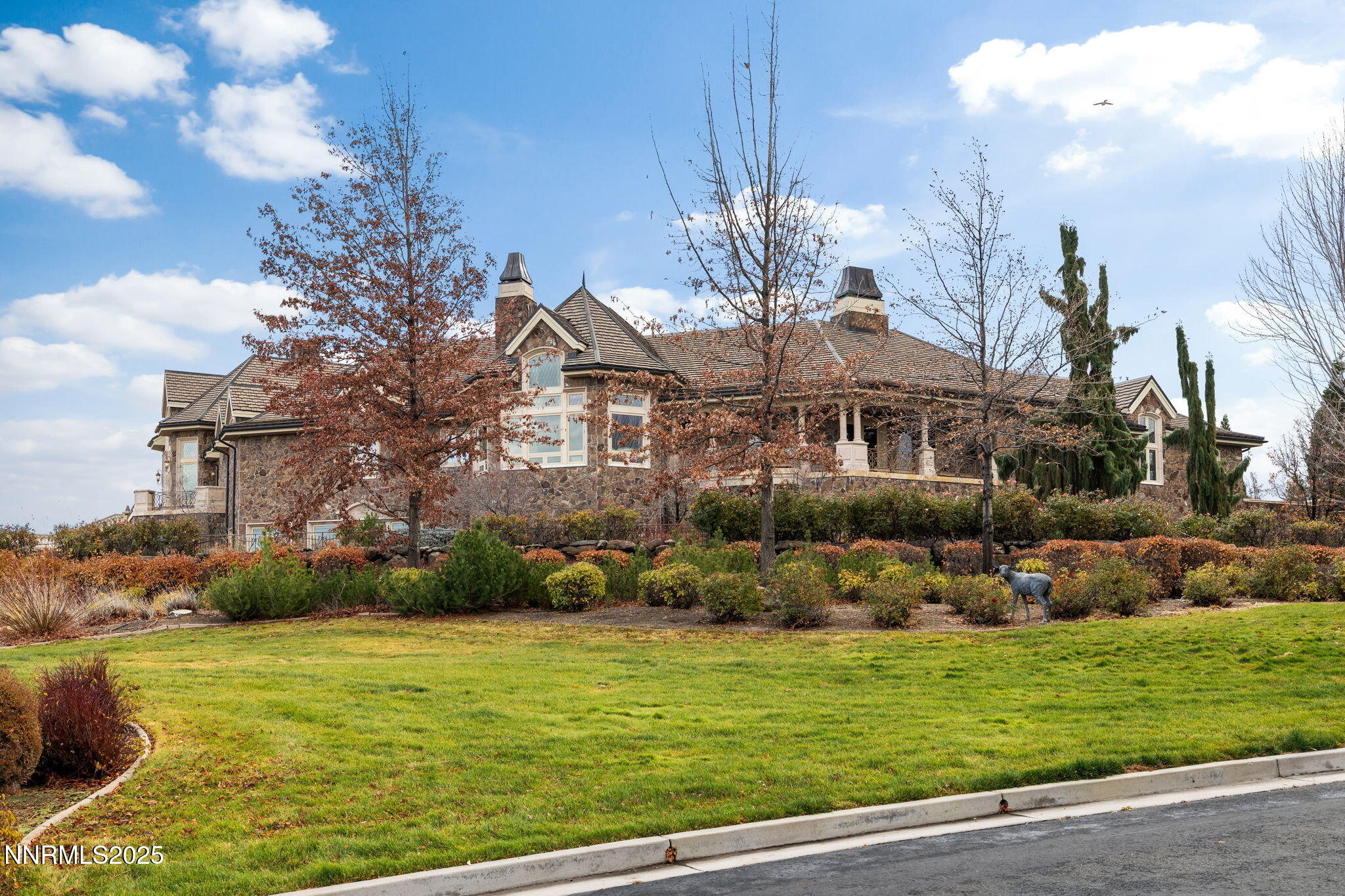 2490 Manzanita Lane Reno, NV 89509 - Photo 24 of 132 a front view of a house with a yard