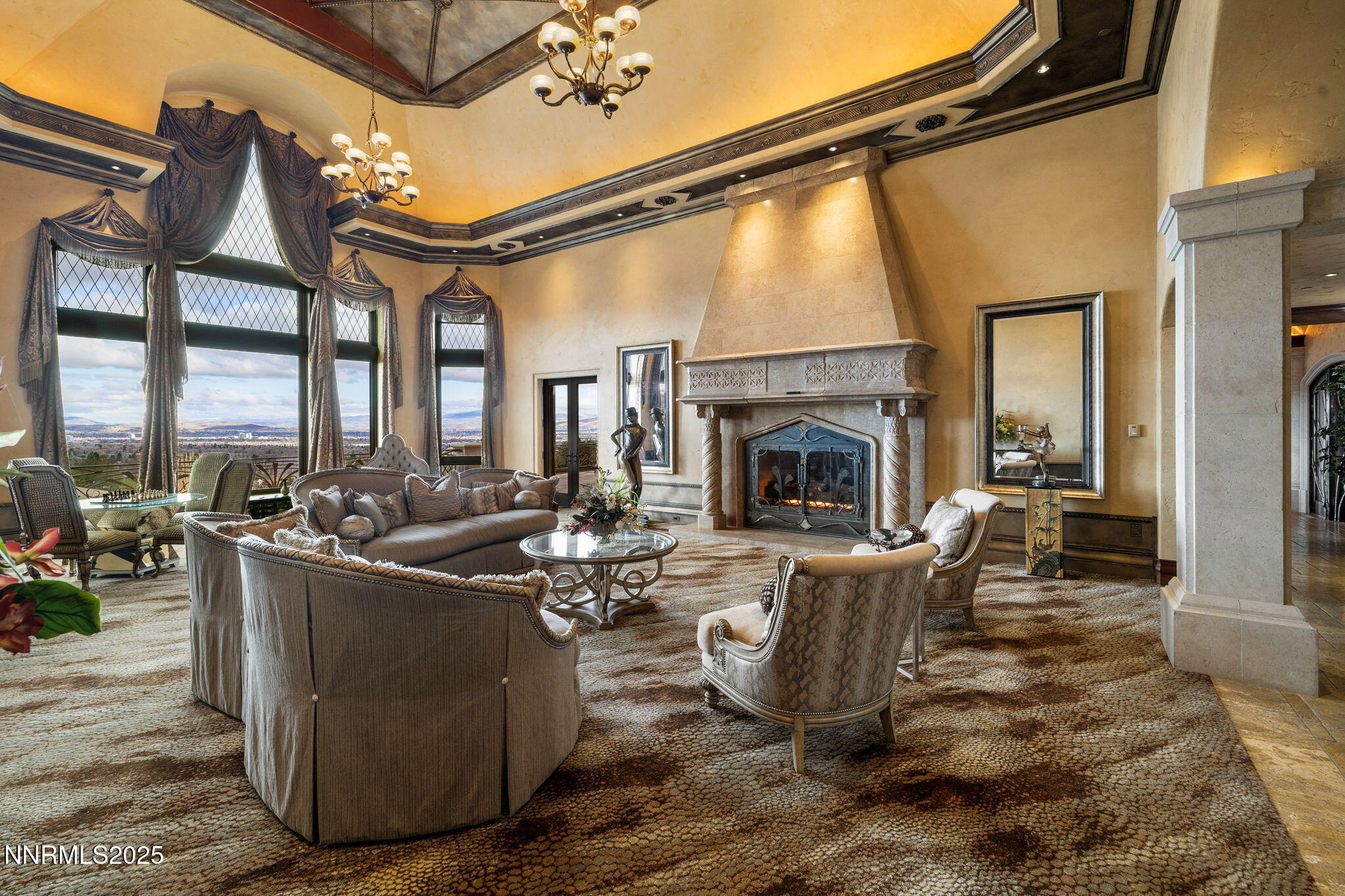 2490 Manzanita Lane Reno, NV 89509 - Photo 35 of 132 a living room with furniture a fireplace and a floor to ceiling window
