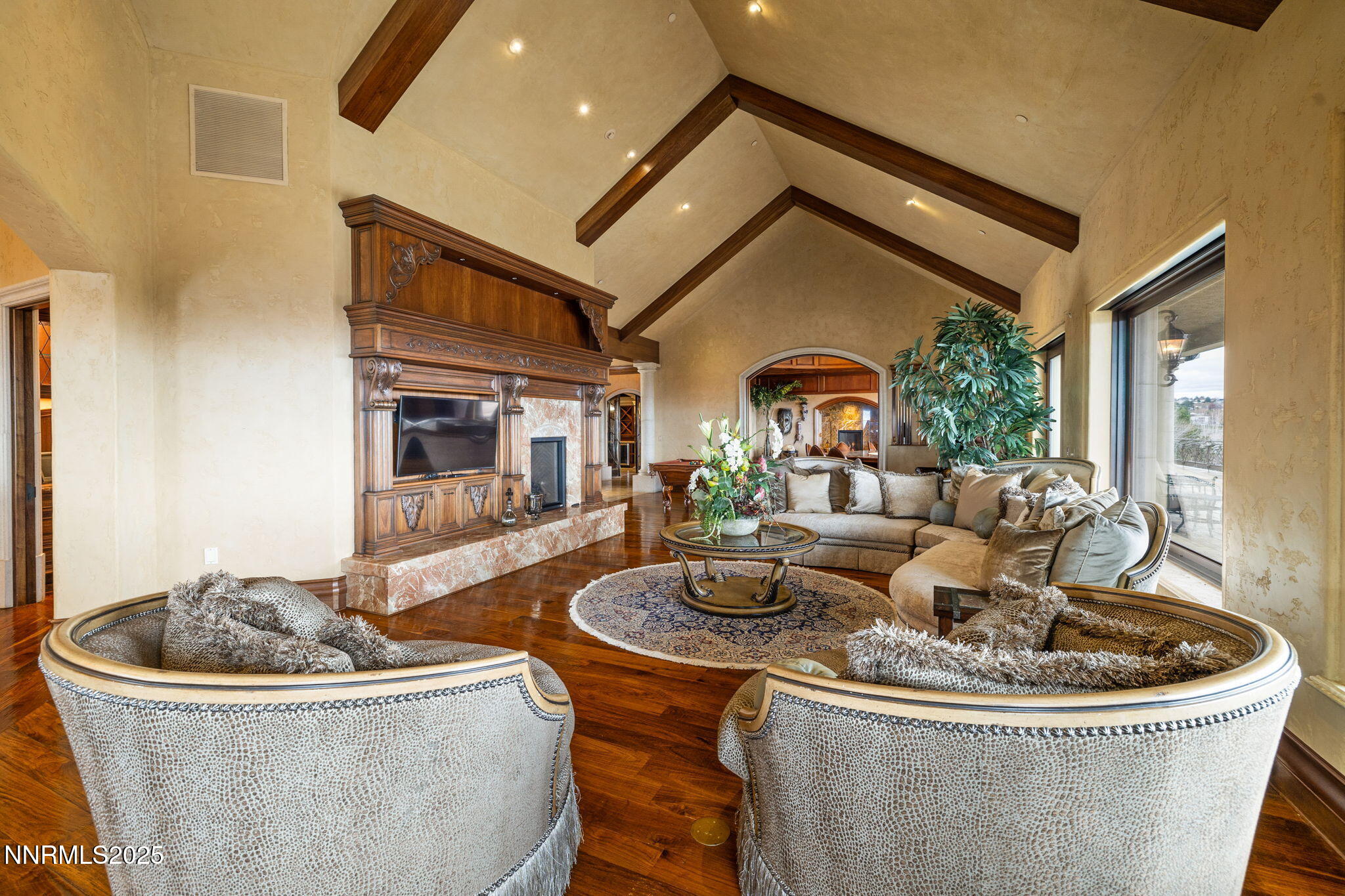 2490 Manzanita Lane Reno, NV 89509 - Photo 44 of 132 a living room with a fireplace and a table
