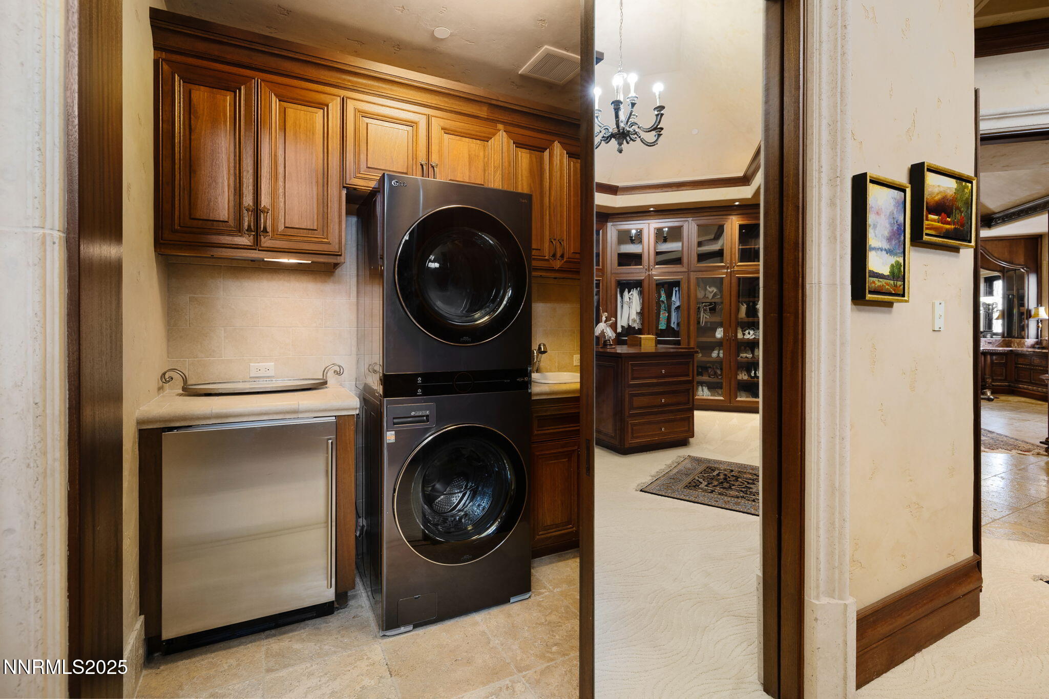 2490 Manzanita Lane Reno, NV 89509 - Photo 76 of 132 a view of a hallway with washer and dryer