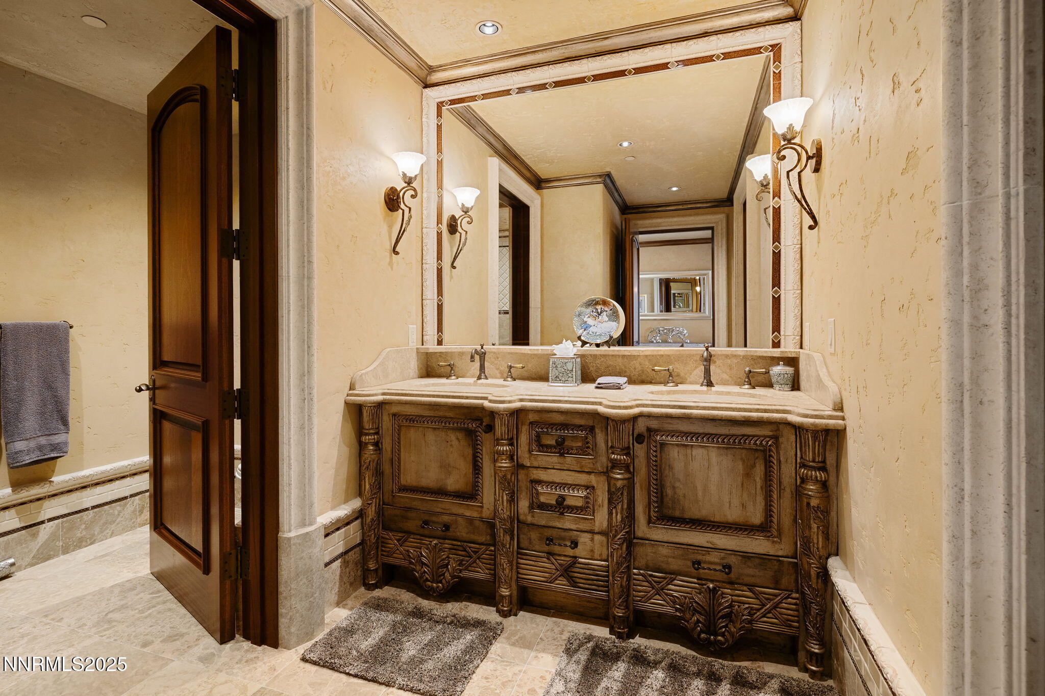 2490 Manzanita Lane Reno, NV 89509 - Photo 95 of 132 a bathroom with a sink a mirror and a shower