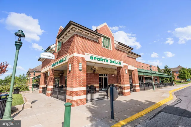 a view of a building with sitting area