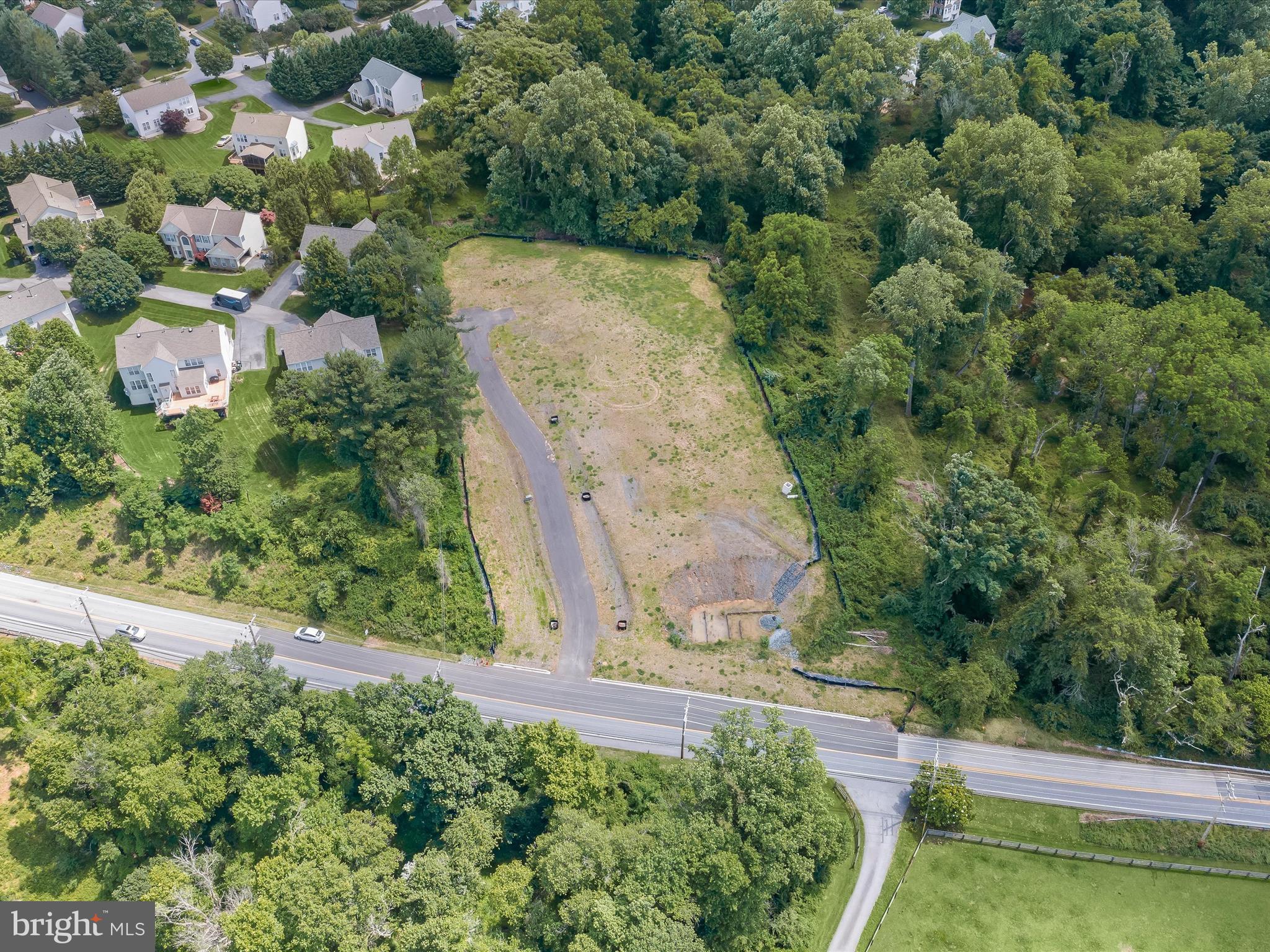 Lot 2 Guilford Road Clarksville, MD 21029 - Photo 5 of 32 an aerial view of a house with a yard