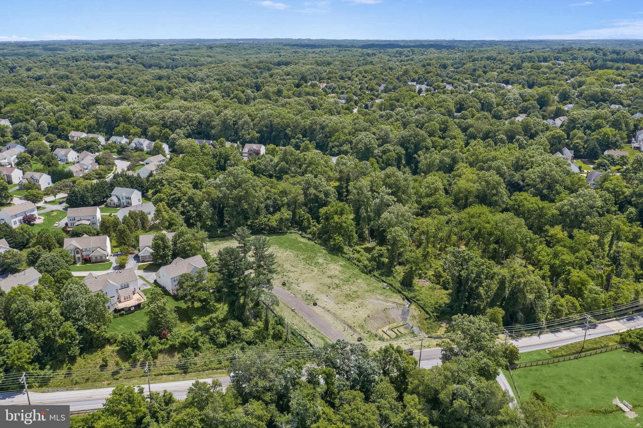 Lot 2 Guilford Road Clarksville, MD 21029 - Photo 9 of 32 an aerial view of a town with trees