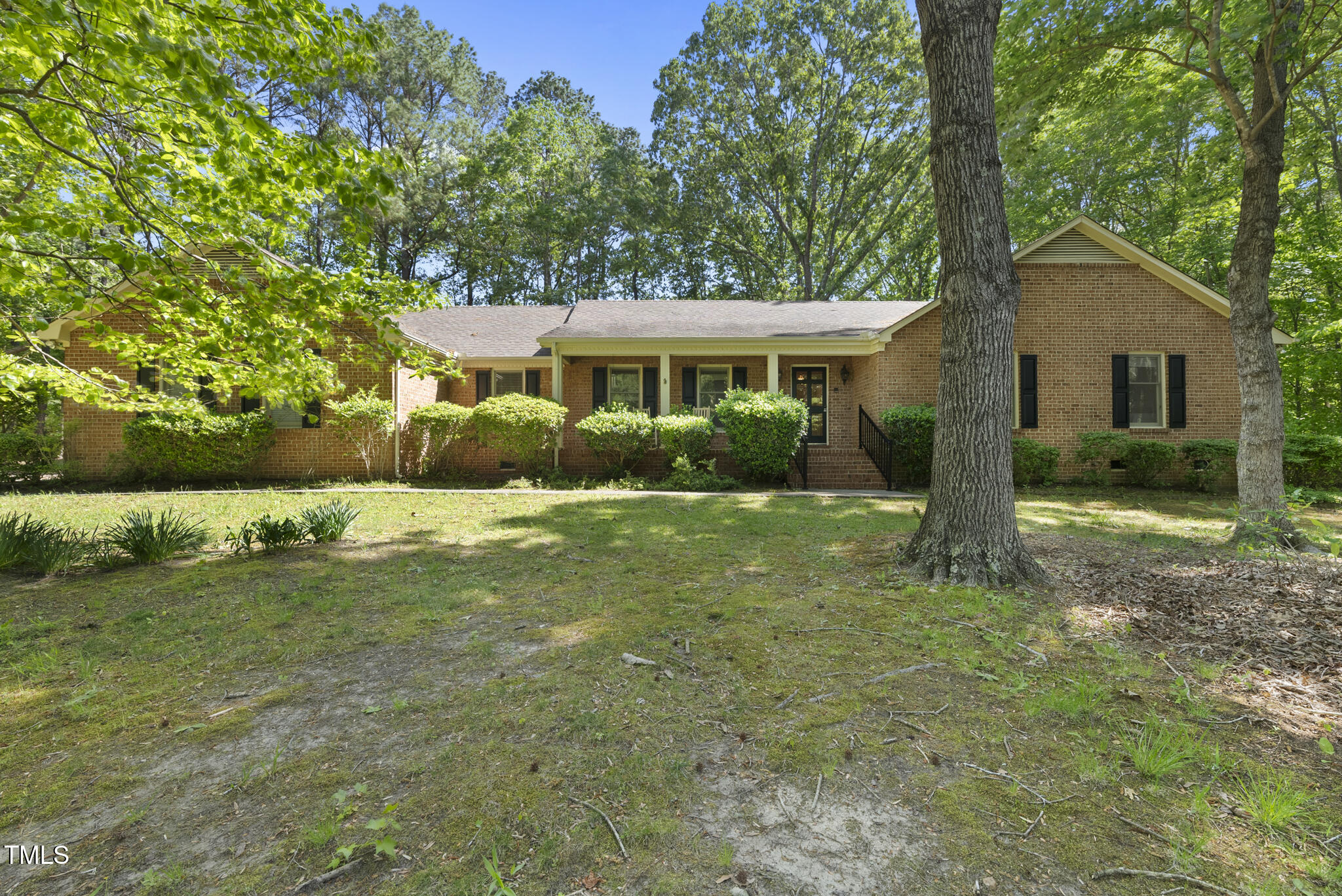 2001 Lovdal Drive Raleigh, NC 27613 - Photo 1 of 42 a view of a house with a yard
