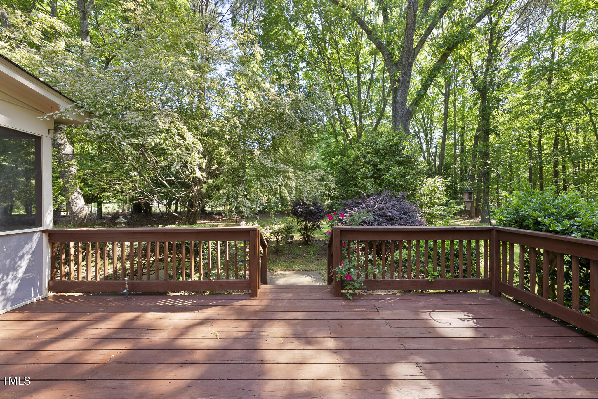 2001 Lovdal Drive Raleigh, NC 27613 - Photo 29 of 42 a view of a street with wooden bench