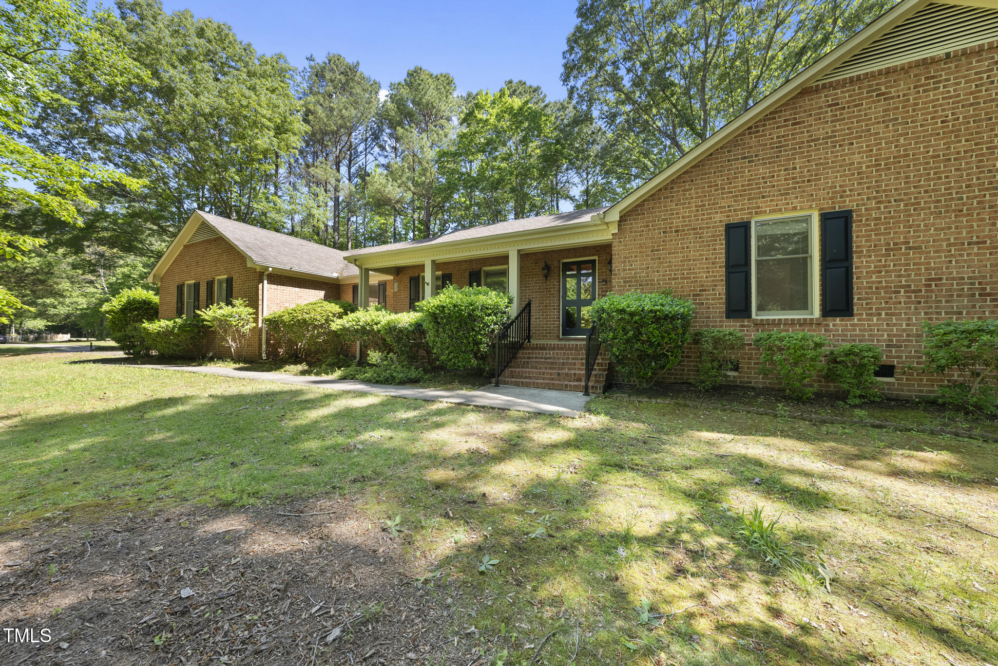 2001 Lovdal Drive Raleigh, NC 27613 - Photo 2 of 42 a front view of house with yard and green space
