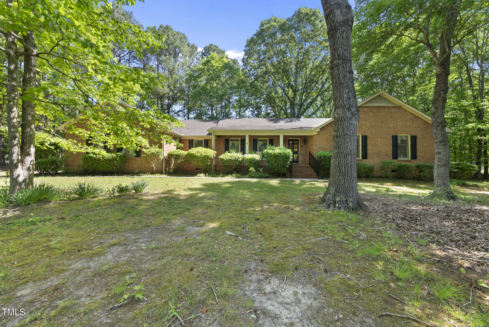 2001 Lovdal Drive Raleigh, NC 27613 - Photo 33 of 42 a view of a house with a yard