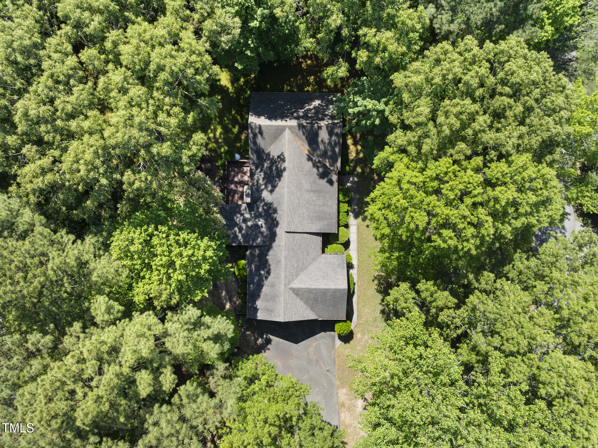 2001 Lovdal Drive Raleigh, NC 27613 - Photo 34 of 42 an aerial view of residential house with outdoor space and trees all around