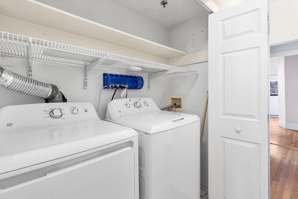 398 Broadway, Unit 2A Somerville, MA 02145 - Photo 19 of 25 a utility room with dryer and washer